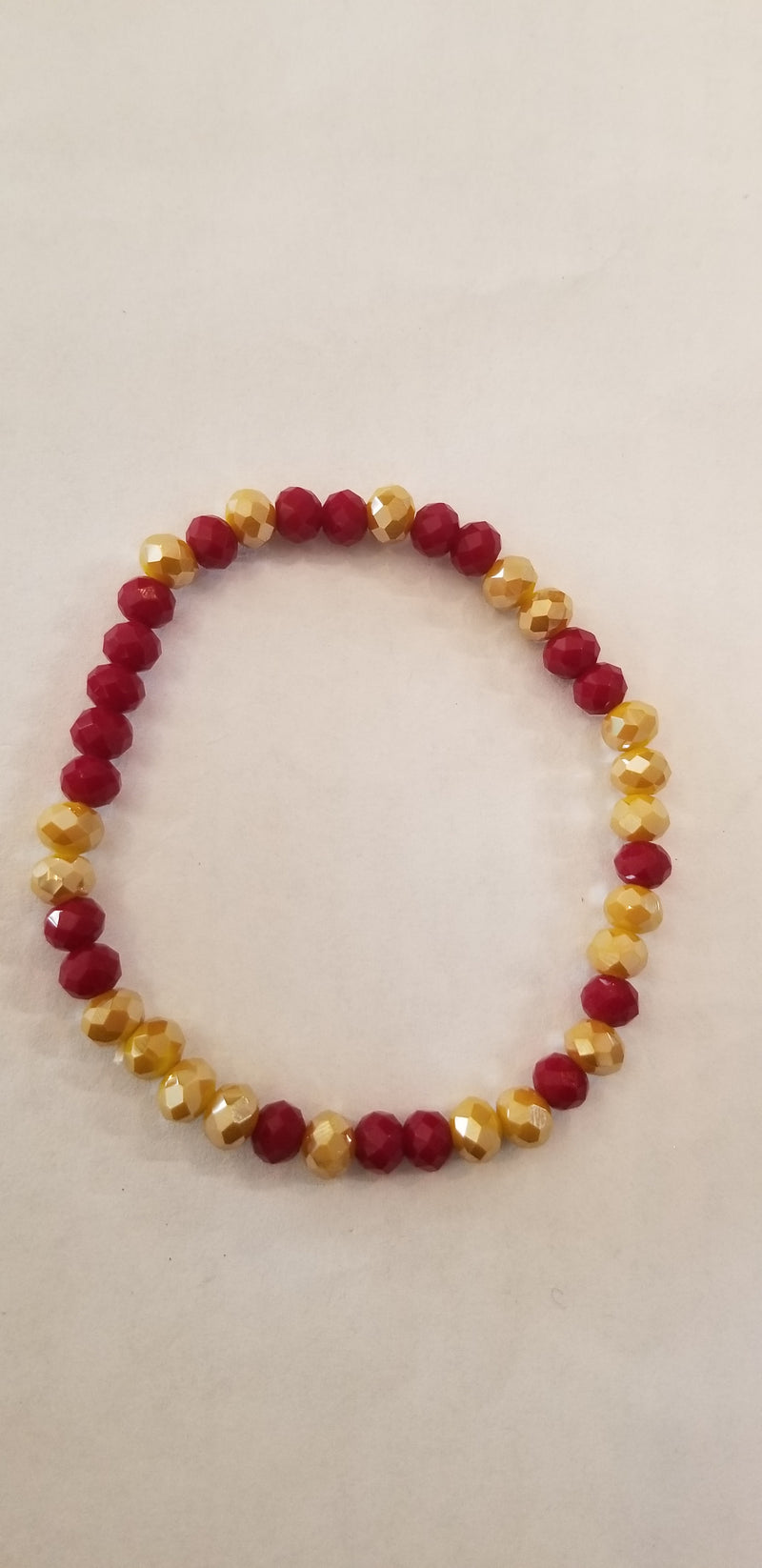 Burgundy and Gold beaded bracelets